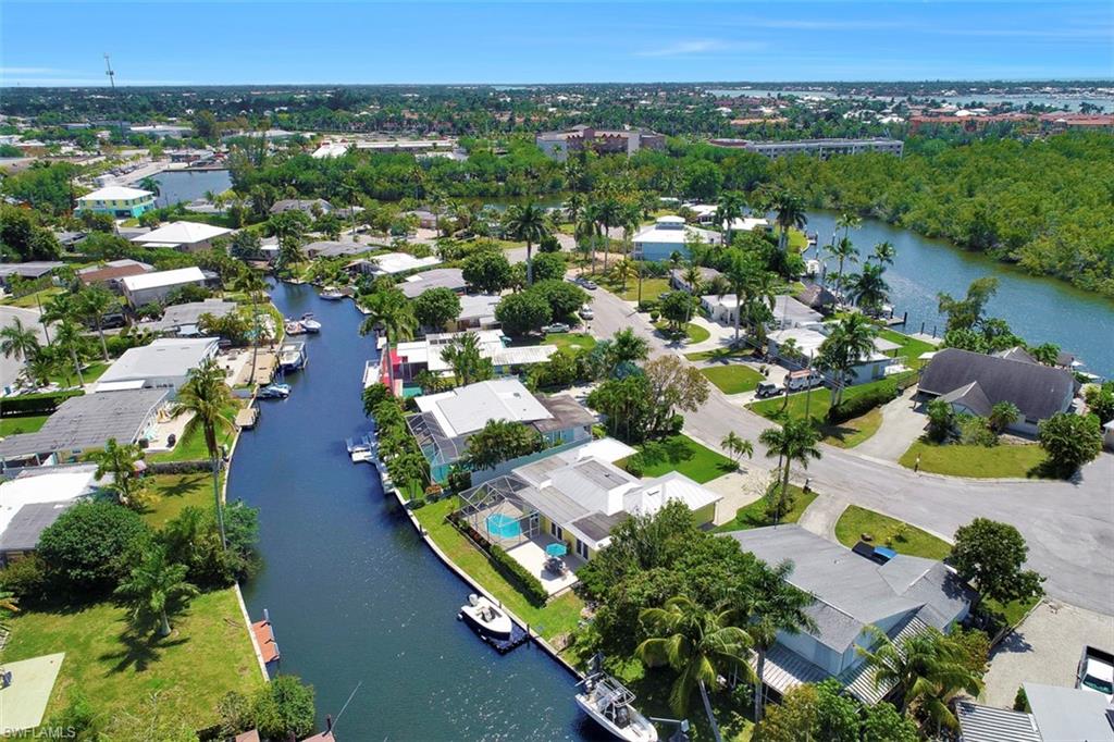 Aerial view along the canal toward Naples Bay